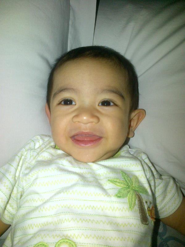 Once he awake, he always put his smile while he looked at me. Luv it!