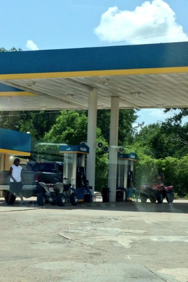kayself12's tweet image. You know you live in East Texas when people stroll up on their four wheeler to get gas. #awlawd