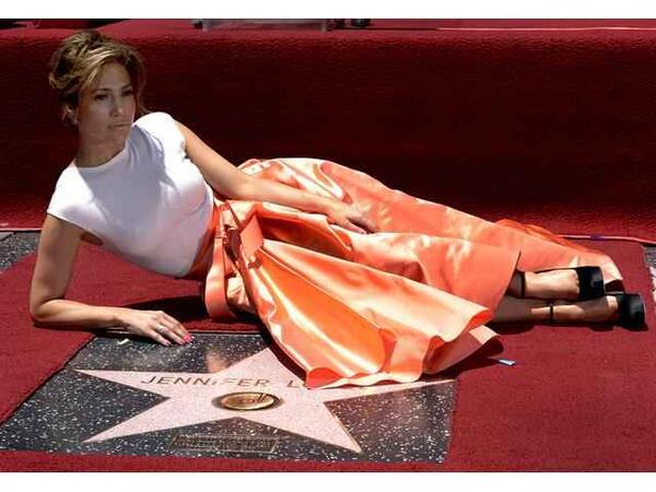legaxypag's tweet photo. this beatiful dress and one wonderful star #OMG the big family of #Legacy and #RalphRomero are so happy for #JLO http://t.co/3EwUL2ZeWU