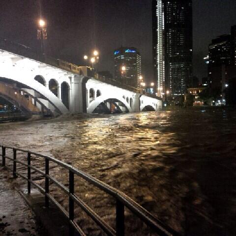 An up close look at the centre street bridge, flowing through lower deck. Courtesy: Alex Halat #yycflood