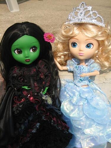 Whoever buys a ticket gets a free #Glinda or #Elphaba doll! Or You can get the #Sanditon Wicked shirts!