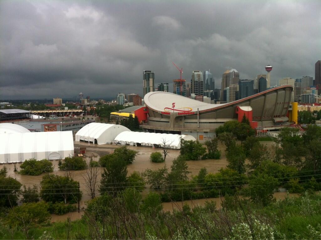 Stunning photos from flooded Saddledome; Flames say arena will be ready for  season