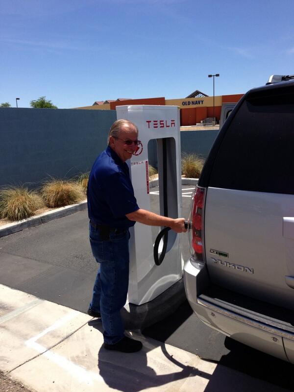 XCTeslatrip's tweet photo. Ron has a little trouble with the charging... I think he's eagerly awaiting a @TeslaMotors #modelx http://t.co/aXabilCpZF