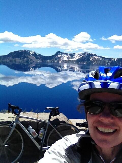 alisongraves's tweet photo. Riding Crater Lake -- no cars -- on a perfect day. Whoa! http://t.co/UitTsHAY9r