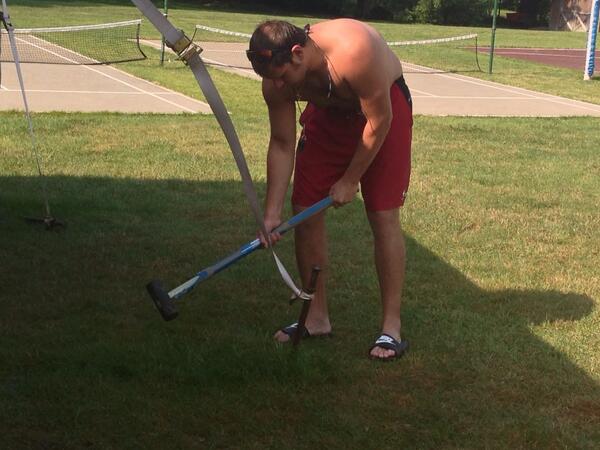 CommSwimClub's tweet photo. Mr. Anderson moving the tent pole. #Excalibur http://t.co/Ld063EW6U6