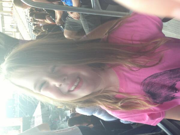 MB_CountryGirl's tweet photo. @taylorswift13 daughters first concert and she is so excited! #RedTour  #happyGirl http://t.co/rWjaNlmxWX