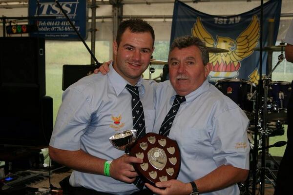Scott giles receiving best back from backs coach dilwyn