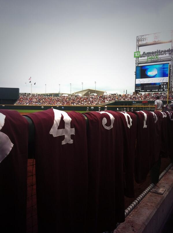 HailStateBBEQ's tweet photo. Maroon 85 style jerseys with a sea of maroon in the back ground. #HailStateCWS http://t.co/ndMvoMUwSR