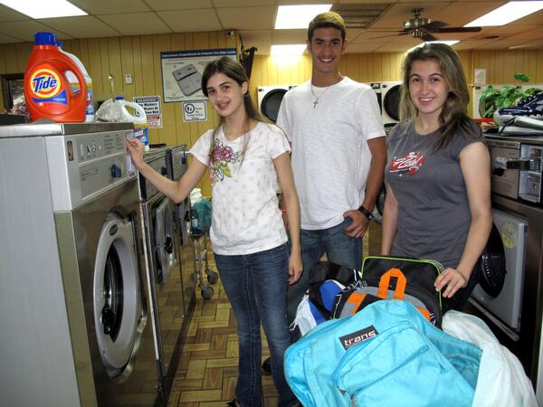 AngelBackpack's tweet photo. Summer Volunteers cleaning backpacks for our next distribution. #angelbackpackcares #helpthecause http://t.co/J5ytjLeC0Q
