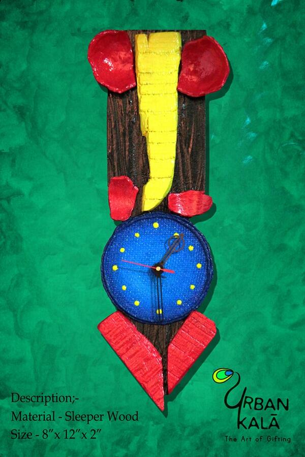 UrbanKala's tweet photo. #Ganesha Wall clock ... made with coconut shells and a cd... How is it guys...?? http://t.co/1Refyzh9NV