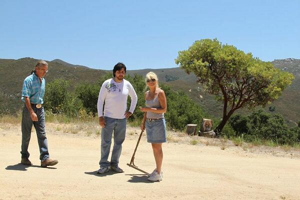 VE2014's tweet image. Director -Sergio Candido on location discussing construction of Cabin with Shane &amp;amp; Gloria Ayon