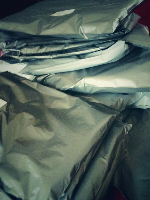 Wow! Today has been busy packing t-shirts and biscuits #busy