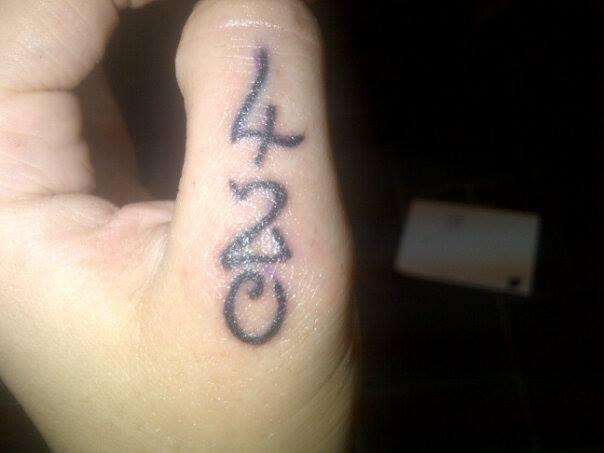 Georgia on Twitter: "Exhibit B: newest finger tattoo on thumb, a tribute to her 20th April birthdate and love of Cannabis. http://t.co/yfZb6fRKM9" / X
