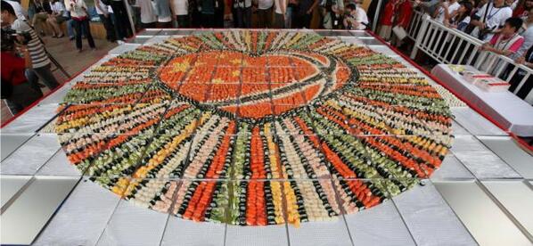 axiarestaurant's tweet photo. World's #‎largest ‎#Sushi ‎#Mosaic, comprised of 8,374 pieces of sushi! Custom sushi platters now available at Axia! http://t.co/LphI1HLu0q