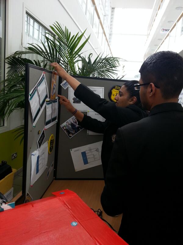 Holyhead students setting up for the Titan Computer Science fair.