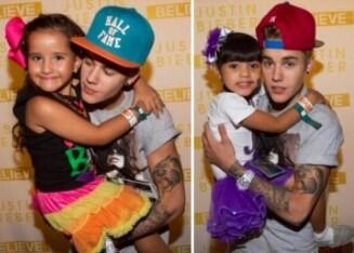 ibieberthought's tweet photo. "justin held the young kids close to his chest so that they couldn't see his shirt" aw http://t.co/ldLbDR5iR0