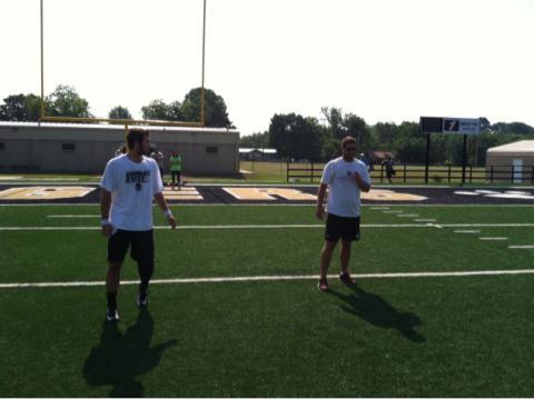 ArRecruitingGuy's tweet photo. 2015 Arkansas QB commitment @tystorey4 and Oakland Raider QB @Tyler_Wilson8 working out at Charleston HS this morn http://t.co/COSmZnTxCD