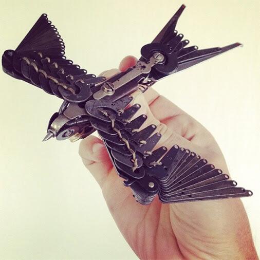 Artist Jeremy Mayer just completed a beautiful set of swallows using assembled typewriter parts: