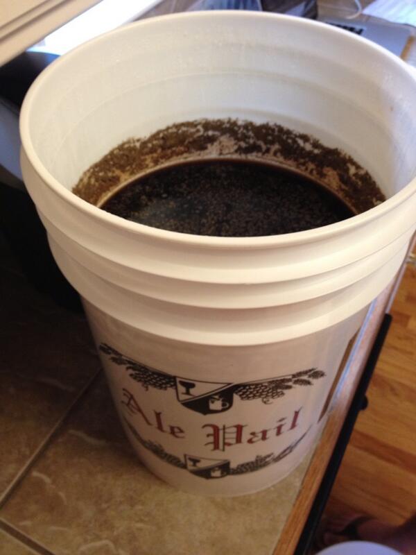 RebeccaWells's tweet photo. @spencermorse 's  first batch o'beer.  It looks disgusting, but hopefully it tastes good! http://t.co/7X0gqWKsMf