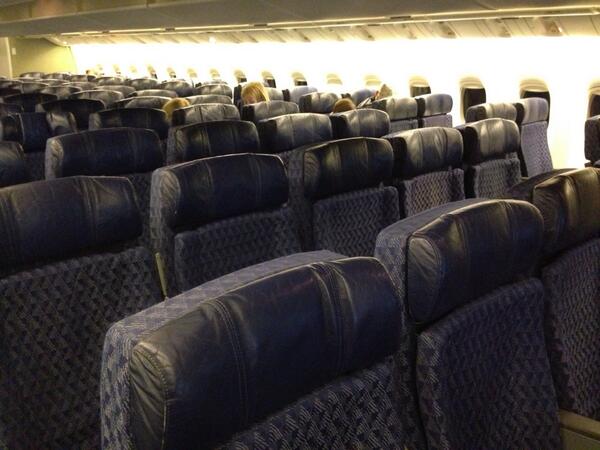 sandraho's tweet photo. Could center seat get any worse? #cruelandunusual @americanair sucks http://t.co/n7c3iksWsM