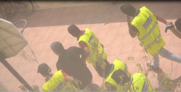 Taltool11's tweet photo. "We will continue our struggle" said Nabeel Rajab, minutes before armed, masked men arrested him.
#Bahrain http://t.co/8CbQr2ZUoD
