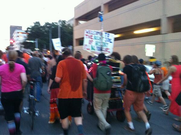 This machine is blasting music. This rally is officially a rave. #sb1