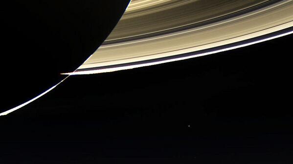 Cassini photographs Earth from 900 million miles away (Yup that tiny booger of a thing near the bottom right, is us)