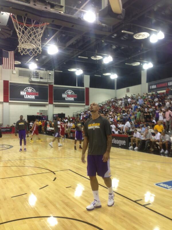 Lakers's tweet photo. Robert Sacre getting loose for tonight’s game. http://t.co/cB5RP4ueCA