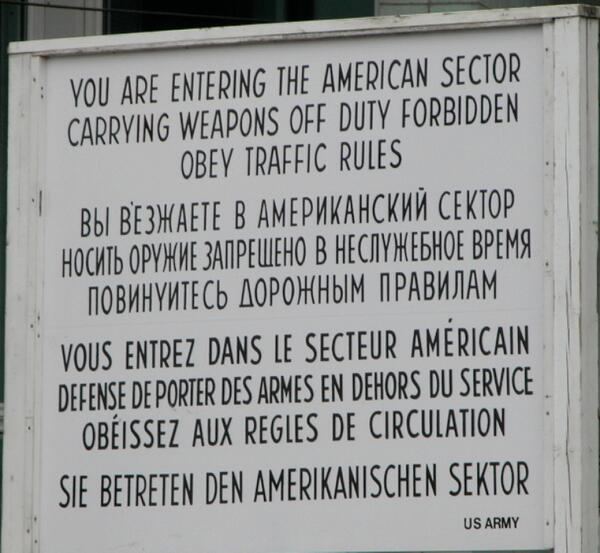 BorderStampApp's tweet photo. “You are leaving the American Sector” sign at Checkpoint Charlie in Berlin http://t.co/ns2U8IKt5L