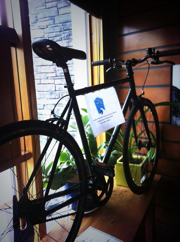 Win this bike tomorrow, July 14th. Each customer gets a draw ticket from 11:30am-5pm. Be here at 5 to win.