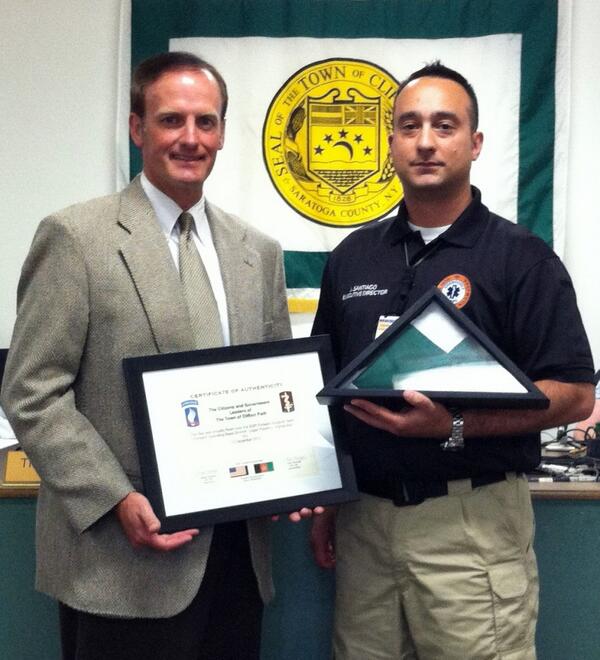 We welcome home Army Reservist Joe Santiago, who flew a town flag over the Afghanistan hospital where he served.