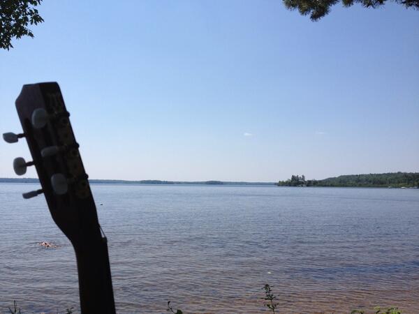 Just kicking back playing guitar by the lake . Wrote a new instrumental