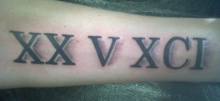 Roman Numeral V Tattoo