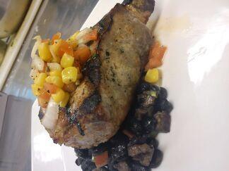 Chef_Russell's tweet photo. Grill pork chop with mango corn salsa over some stewed black beans. @vcm553 #buildmyrecipe @FoodPorn http://t.co/tLd0zasKpV