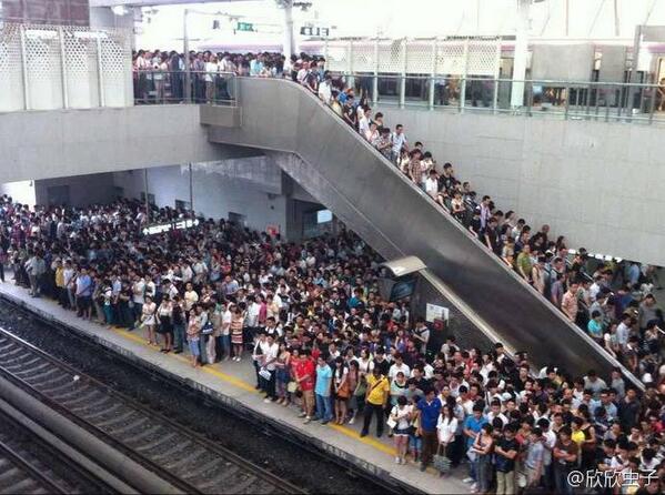 Photo of people standing in line at Xierqi Station in Beijing, glad I don't have to make that commute again