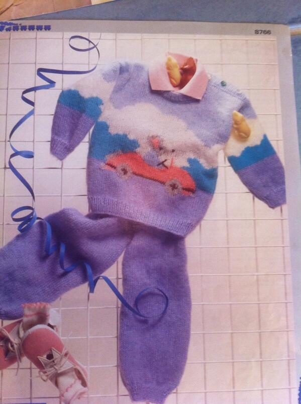 Mum has laid out a few knitting patterns for the baby. This ones the winner. Jazzy outfit for a little lad