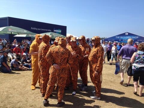 Tiger Woods followed by grown men wearing tiger costumes at British Open (Photo)