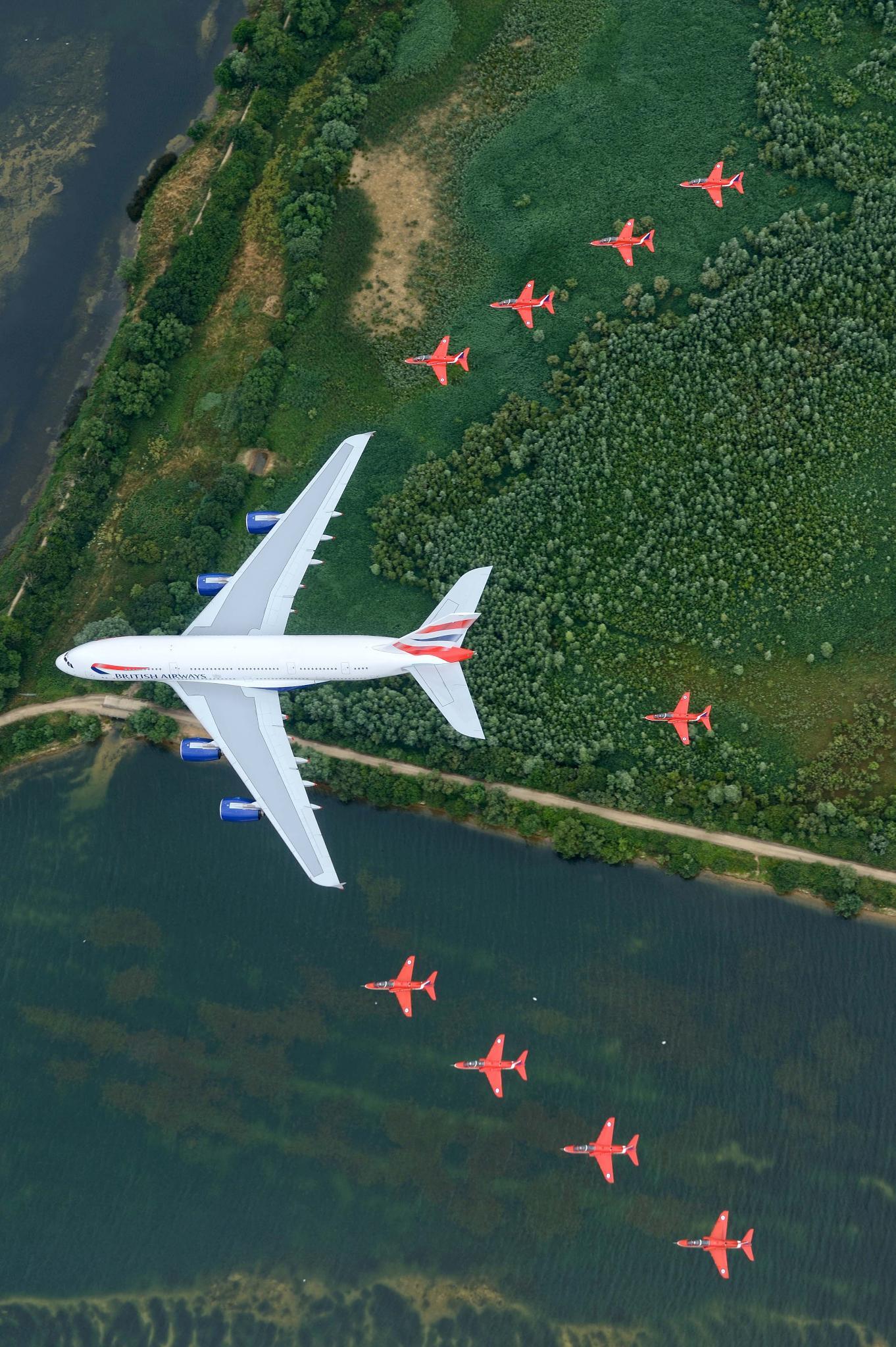 a group of airplanes flying in the sky