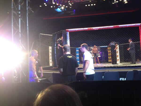 JonathanShrager's tweet photo. Pic of @LeeroyBarnes heading into the cage whilst an onlooking Paraisy awaits his imminent beating #CWFC57 http://t.co/ZeWUKrdMb3