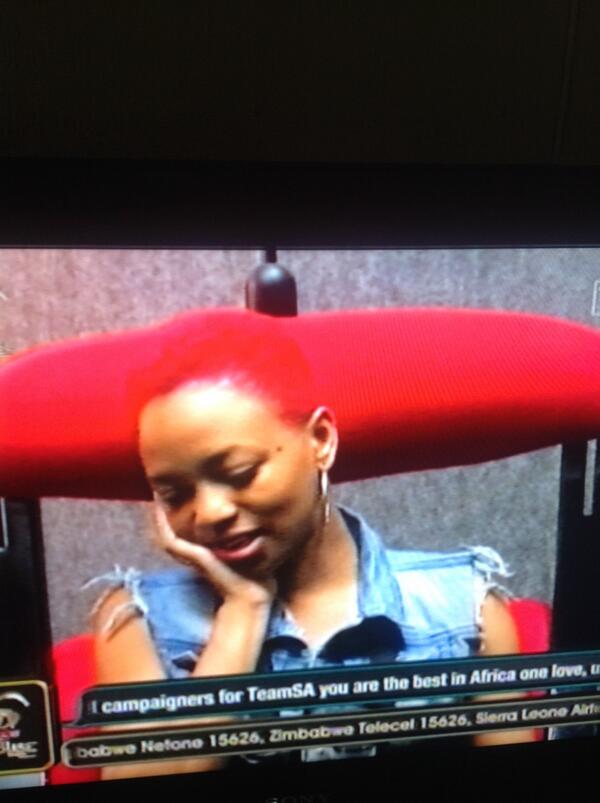 Dstroid's tweet image. Feza's hair blends into #BBATheChase chair