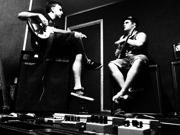 DamnClickers's tweet image. Our guitarist Rob (@bobknarwhal) and our bassist Jon go over some riffs... #DamnClickers