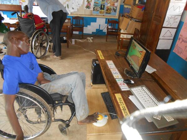 UgBritish's tweet photo. Retweet if you believe that Epid Lawrence who uses his feet to control a computer is amazing! #DifferentlyAbled http://t.co/LFiaTQY2lw