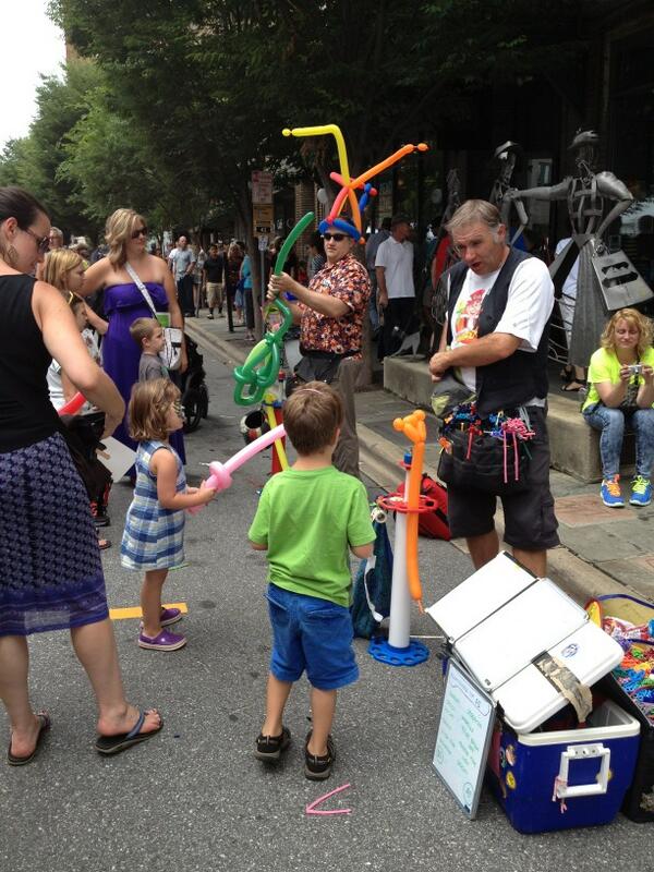 belechere's tweet photo. Balloon benders Professor Whizzpop and Mark Deverges craft colorful characters for children at #BeleChere. http://t.co/prUvF7rj2l