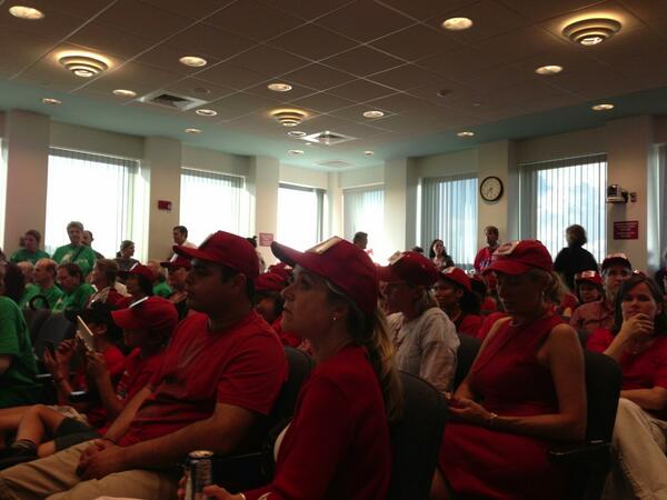 katesp's tweet image. Live from the mtg. Lots of red shirts!