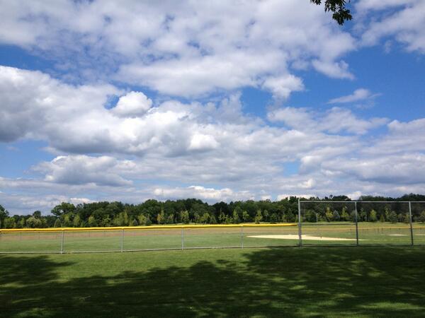 Carknack's tweet image. Beautiful summer day for a walk in the park -- low humidity, 78F and "The Simpsons" clouds.