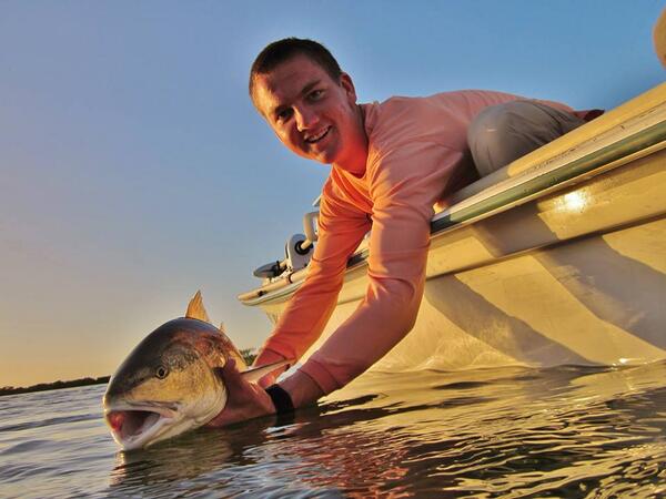 CAMBrevard's tweet photo. Beautiful Mosquito Lagoon redfish and amazing photo. Eli LaMarre caught the 32" red on a guided trip Michael Camilli. http://t.co/v5rf1Tgsa2