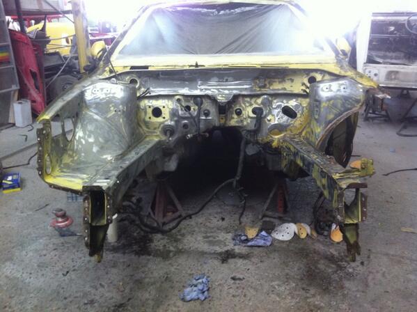 autorprbreaston's tweet photo. Black paint removed, old damage repaired badly so new inner wing, F panel, and X member http://t.co/HrODfSIubL