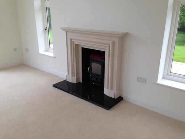 Clearview Stove, best on the market, with a limestone fireplace.