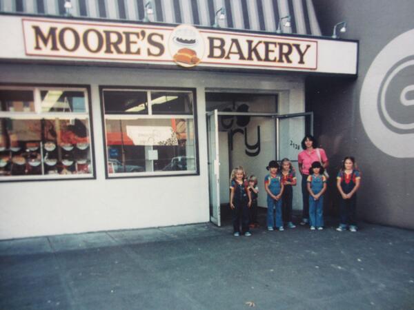 MooresBakery's tweet image. Here's a picture of the #MooresBakery storefront in the early eighties. Two of the kids in the photo work here today!