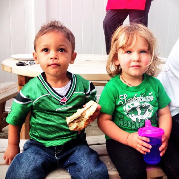 RLPRegina's tweet photo. Two of our Jr. RLP'ers gearing up for the big @sskroughriders game at the office BBQ! #GoRiders #RLP @Royal_LePage http://t.co/VTUQ2cw8nd